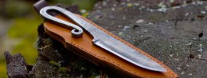 forged knife in leather sheath